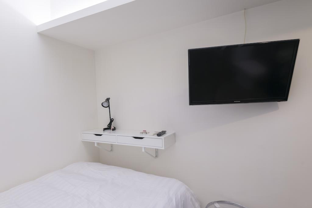 Home Plus Inn Hong Kong Quarto foto